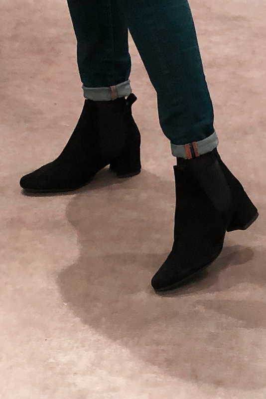 Matt black women's ankle boots, with elastics. Round toe. Low flare heels. Worn view - Florence KOOIJMAN